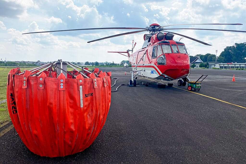 nomad aviation fire fighting sikorsky s 61 a and bucket on tarmac