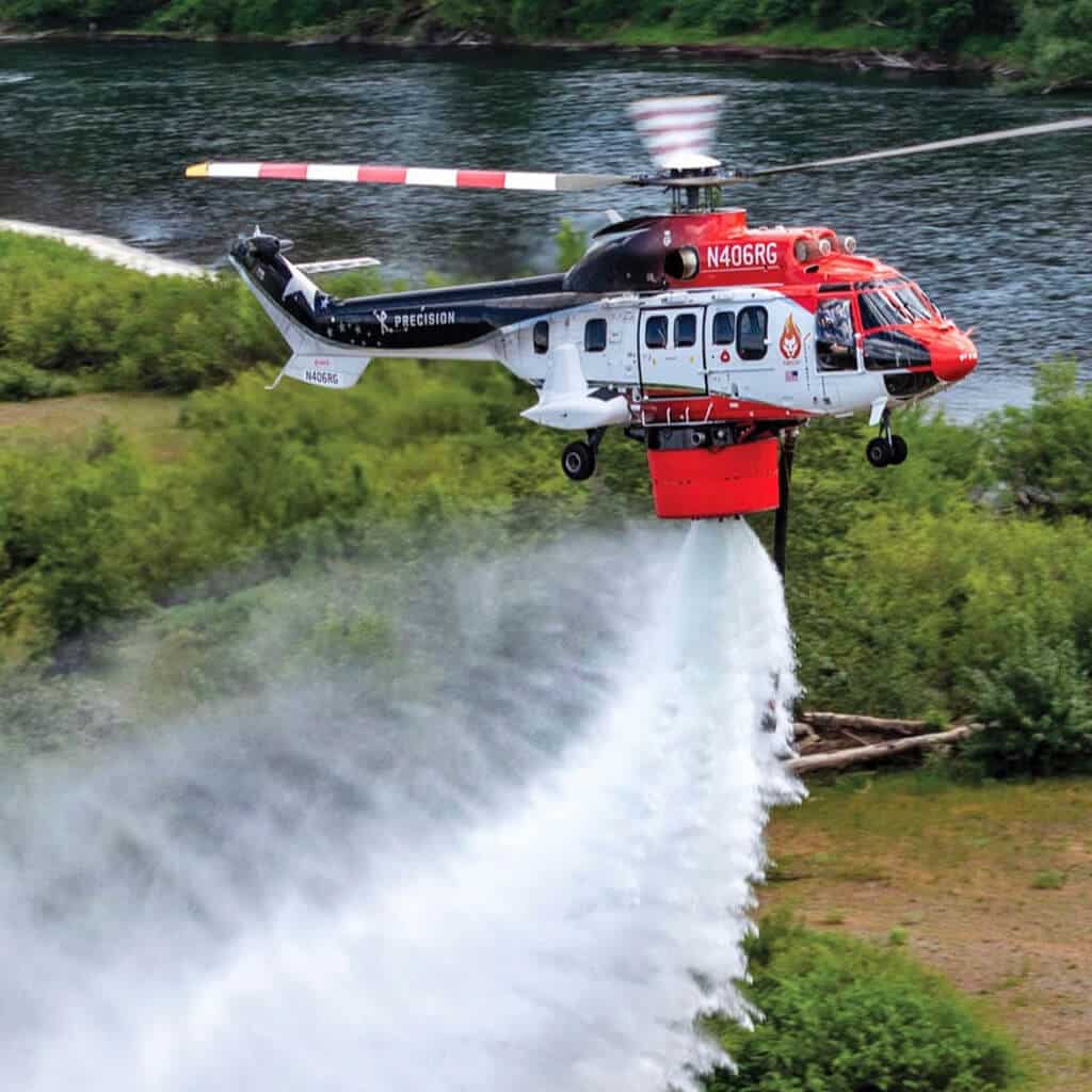 nomad aviation precision helicopters firefighting super puma dropping water